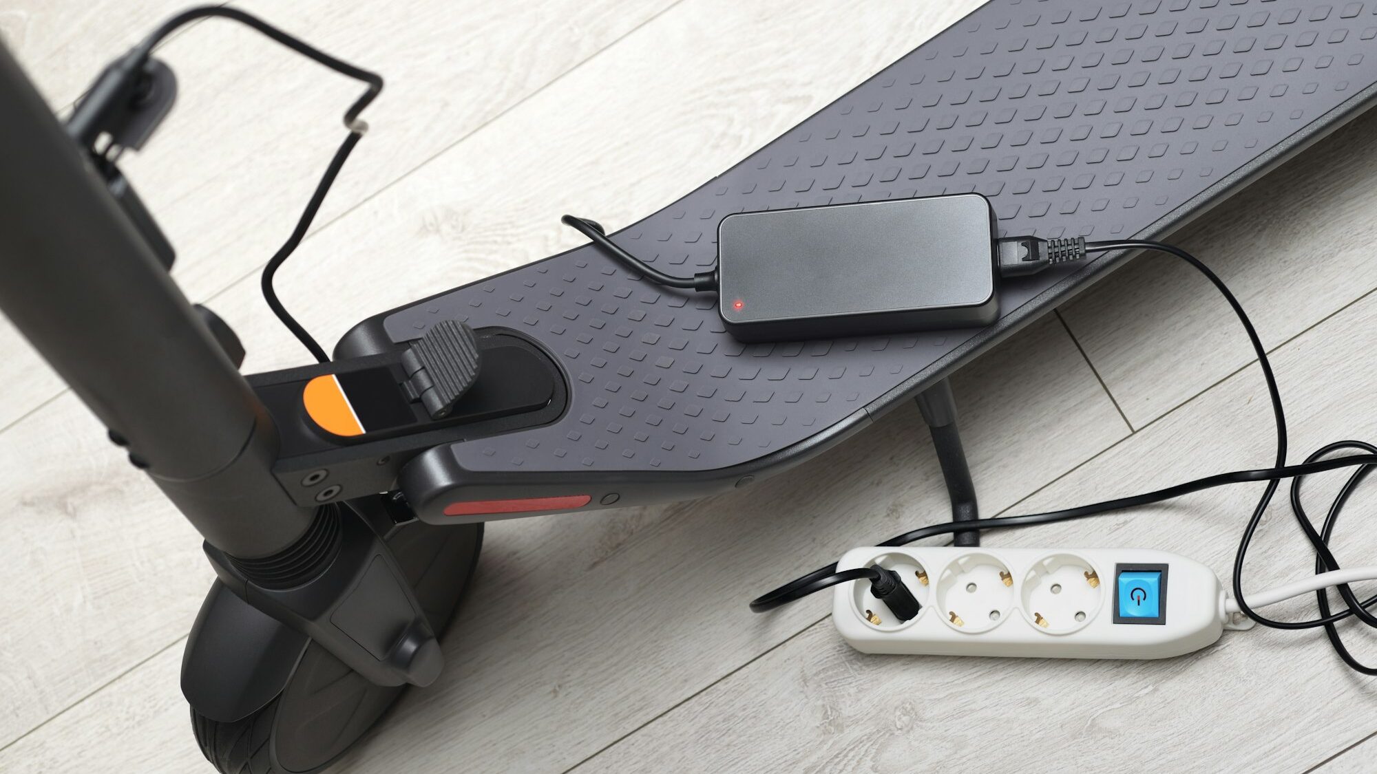 Battery charging process of electric motorized scooter.