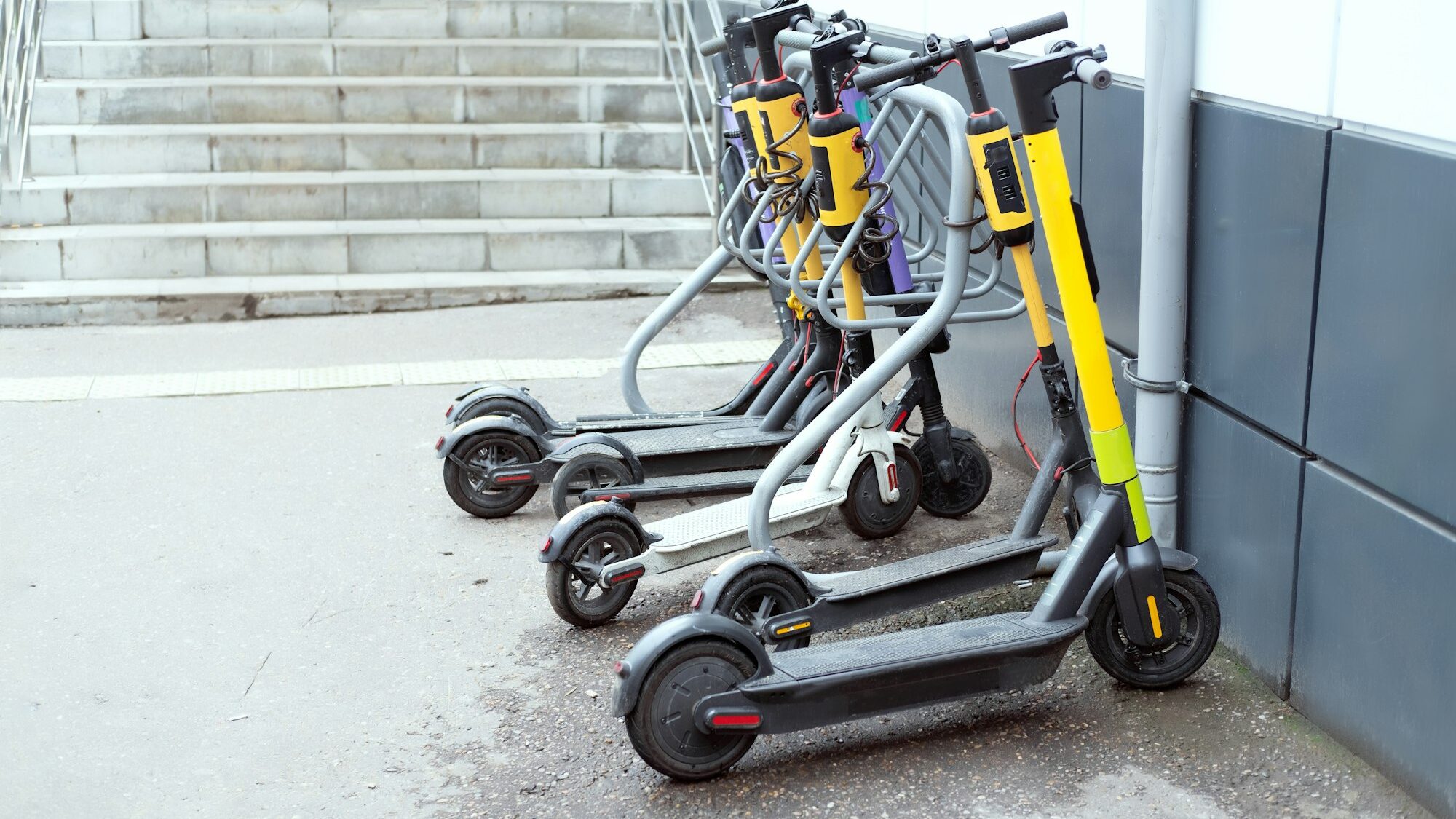 Parking for electric scooters. yellow scooters on the street