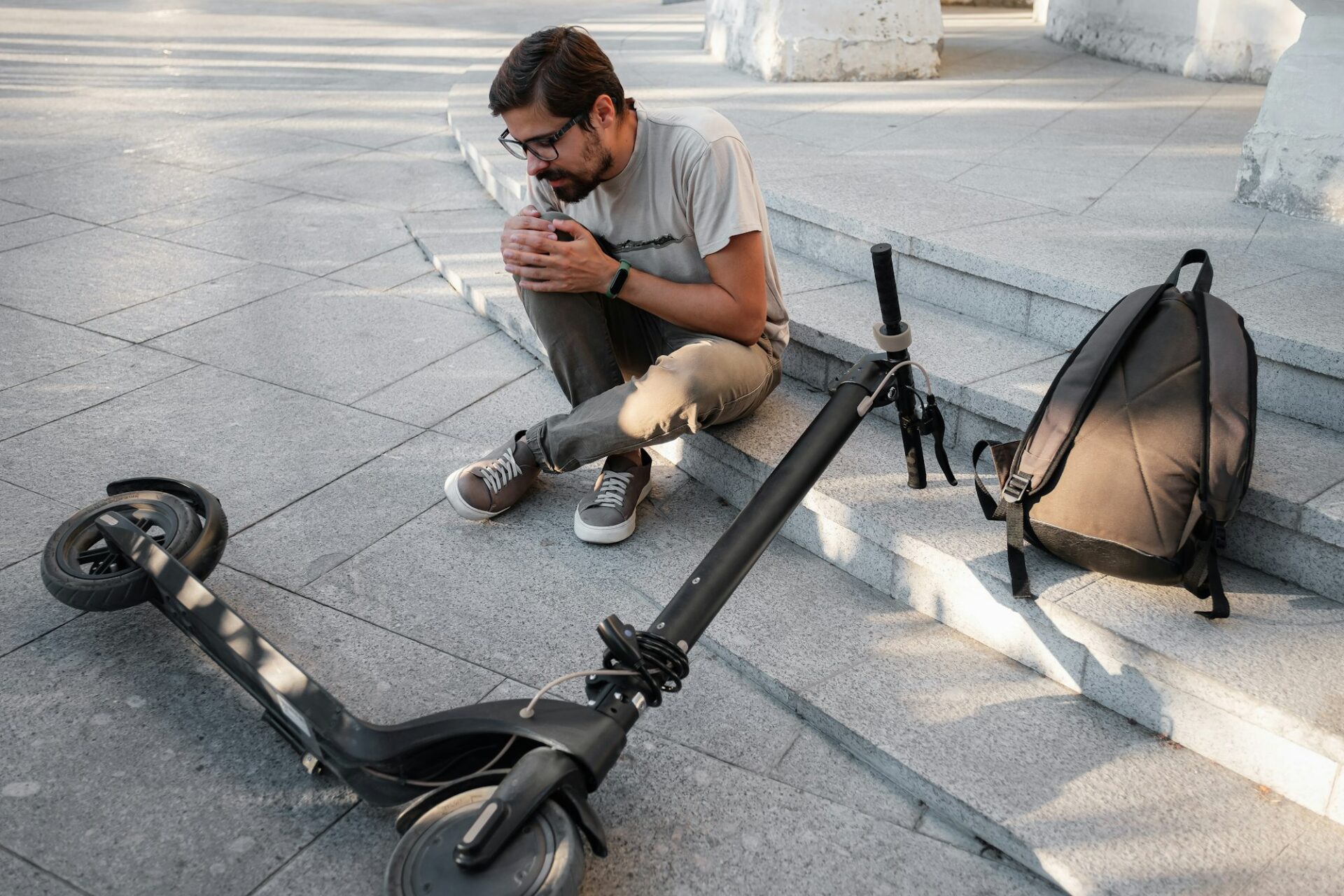 Man after without electric scooter safety gear.